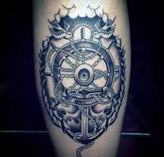 Ship anchor and steering wheel drawn in tattoo style. Beautiful Nautical Style Black And White Ship Steering Wheel With Anchor Tattoo On Thigh Tattooimages Biz