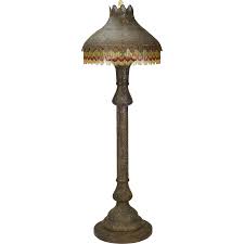 This Towering Antique Pierced Brass Floor Lamp With Unique Lighted Base Brass Shade And Added Fringe Detail Circa 1900 Is Exc Lamp Floor Lamp Brass Floor Lamp
