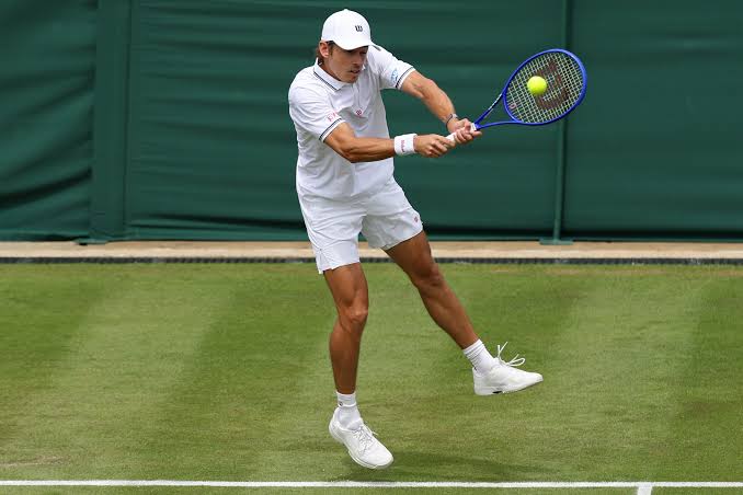 Honorary Brit De Minaur eases into second round | Reuters