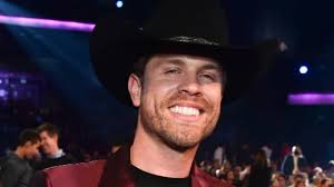 Dustin Lynch keeps "Party Mode" going with "Stars Like Confetti"