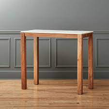 The finisterre marble oak table with a carrara marble top from belgian company heerenhuis is also available from uk company different like a zoo. Palate High Marble Top Dining Table Reviews Cb2