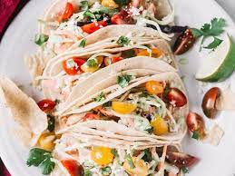 This healthy taco salad recipe is perfect for summer! Grilled Salmon Tacos Served With Jalapeno Ranch