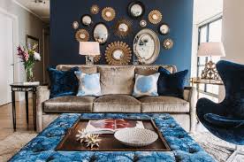 Attach fabric flowers around a corner of the mirror for a floral effect. 17 Beautiful Living Room Decorating Ideas With Wall Mirrors