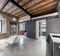 Industrial style incorporates rough metal, concrete, cinder block, cables, bolts and exposed brick in both the architecture and decor. Top 50 Best Industrial Interior Design Ideas Raw Decor Inspiration