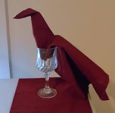 Flip the napkin over so the folded edge is underneath. How To Fold A Napkin Into A Peacock Lovetoknow