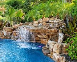 صورة Swimming pool with waterfalls