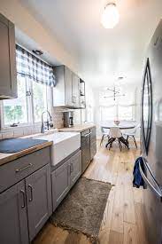 Spacious rooms with hardwood flooring and updated kitchen. What Is A Raised Ranch And How We Updated Ours Amanda Katherine