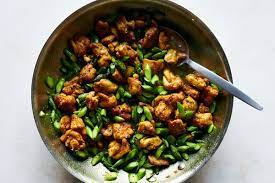 Turmeric Black Pepper Chicken With Asparagus Recipe Nyt Cooking Stuffed Peppers Chicken Asparagus Chicken Stuffed Peppers