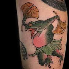 The koi tattoos are very popular, and this one has some bright and beautiful colors. Japanese Frog Tattoos All Things Tattoo