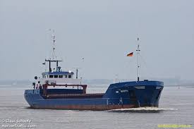 sinking cargo ship towed to safety