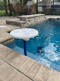 Develop a unique space with our lounge chairs and occasional chairs, that will help make every space special. Baja Table Sun Shelf Umbrella Table For Ledge In Swimming Pool Aughog Products Beach Umbrella Sand Anchors Sandbar Anchors And More
