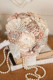 Check out our bouquets & corsages selection for the very best in unique or custom, handmade pieces from our shops. Vintage Inspired Fabric Flower Bouquet Lace Bridal Bouquet Ivory Cream And Champagne Brooch Wedding Bouquet Wedding Brooch Bouquets Lace Bridal Bouquet Bridal Brooch Bouquet