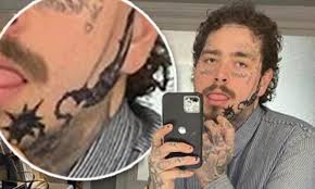 See the video of post malone explaining his. Post Malone Shows Massive New Facial Tattoo Of Weapon Ahead Of New Year S Rockin Eve Performance Daily Mail Online