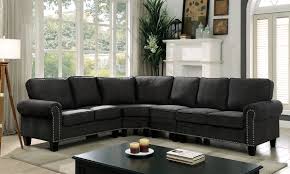 Each piece is designed to match with the other. Elwick Collection Dark Grey Sectional With Nailhead Trim