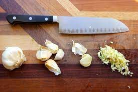 Trim off the dry stem end of the clove. How To Chop Garlic 8 Steps With Pictures Instructables