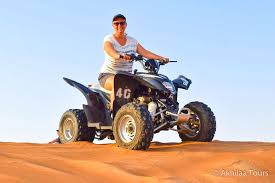 Quad biking with transportation one hour 350 aed per person. Morning Safari With Quad Bikes Sandboarding Camel Ride Akhilaa Tourism