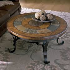 It can tie room decor together and add both style and function. Riverside Stone Forge Round Coffee Table 31005 Riverside Furniture
