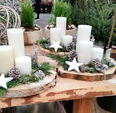 kaarsen op boomstronk baumscheiben deko weihnachten weihnachtsdeko weihnachten deko weihnachten