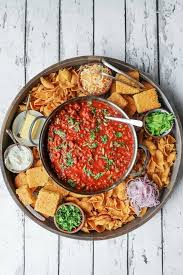You can serve it up with a few complimentary side dishes or all by itself. Epic Chili Dinner Board Recipe Reluctant Entertainer Chili Dinner Dinner Board Favorite Chili Recipe