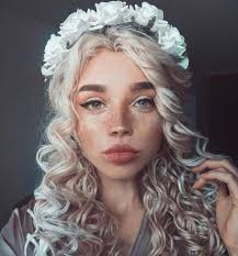 This hair provides almost endless opportunities in creating a unique style and emphasizing your personality. 10 Unique Looking Women Who Can Catch Everyone S Attention Most Beautiful Faces Curly Hair Styles Hair Styles