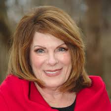 Should clear plastic pots be put back in decorative pots for orchid roots?