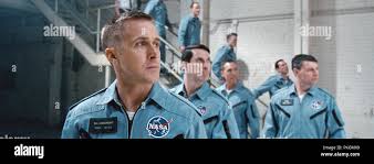 FIRST MAN, front, from left: Ryan Gosling as Neil Armstrong, Shawn Eric  Jones as Wally Schirra, Patrick Fugit as Elliott See, 2018. © Universal  Pictures /Courtesy Everett Collection Stock Photo
