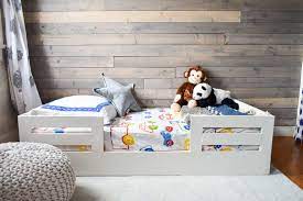 I've seen several designs for house shaped beds, but this one is a little different because it's got solid sides to help prevent roll out. How To Build A Toddler Bed With Bed Rails At Charlotte S House