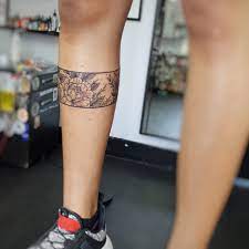 Women Dotwork Band Tattoo With Flowers Around Leg Leg Band Tattoos Arm Band Tattoo For Women Leg Band Tattoo Women