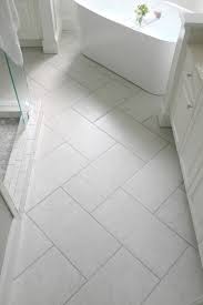 This is a great way to mix things up but still keep your bathroom classic. 25 Unique Bathroom Floor Tiles Ideas For Small Bathrooms Bathroom Tile Designs Master Bathroom Renovation Small Bathroom Remodel