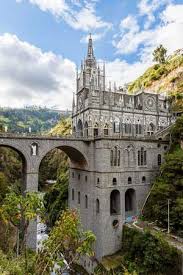 As an example of this magnificence, consider how the most holy virgin has stamped her image on the imposing cliffs of the guaitara canyon, colombia, thereby becoming queen of the souls in that region and in all surrounding lands. Las Lajas Sanctuary Cathedral In Ipiales Colombia Pilgrim Info Com