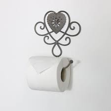 Toilet paper holder is made of natural jute rope and a metal brackets of silver color. Grey Heart Toilet Roll Holder