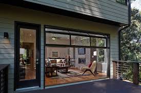 Use storm doors with screen inserts. Garage Door Styles That Work Indoors Wsj