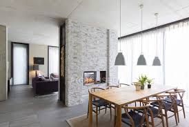 Pendant Lights Over Dining Table In Modern Dining Room With Fireplace Horizontal Indoors Stock Photo 347352978