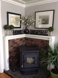 A contemporary look and minimal design, thanks to the fact that there are no exposed vents, plus the option of heating several rooms at once with the patented comfort air® system. Corner Pellet Stove Changed Out Wall Color And Added Plants For A Summer Mantel Uploaded By Nb Rh Wood Stove Decor Stove Decor Corner Wood Stove
