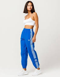 Black And Gold Adidas Pants Women S Adidas Lock Up Blue Womens Track Pants In 2020 Track Pants Women Track Pants Outfit Adidas Pants Outfit