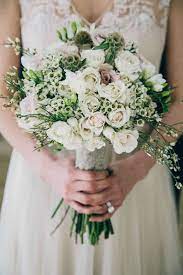Beautiful, lush green and ivory wedding bouquet. 57 Innocently Beautiful White Bridal Bouquets Weddingomania