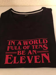In A World Full Of Tens Be An Eleven Shirt Stranger Things In A World Full Of Tens Be An Eleven Tee Etsy Graphictees Tees Ten