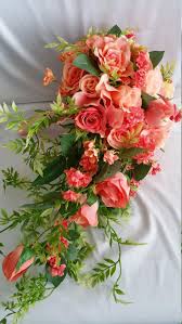 Where to pick flowers for free. Bridal Cascade Bouquet Coral Peach Many Sizes Disc Package Etsy In 2021 Wedding Flower Arrangements Pink Flower Girl Bouquet Coral Flowers