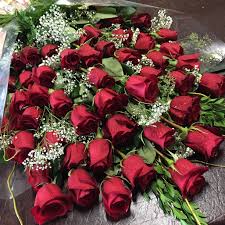 Order christmas flowers, mix flower bouquets, carnations, flowers for new year etc. 4 Dozen Wrapped Roses In Los Angeles Ca Westwood Flower Shop