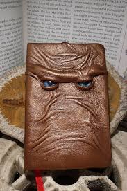 Mythical Beast Book Bronze Leather With Blue Eyes Etsy Leather Book Covers Leather Books Halloween Spell Book