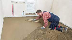 I have a concrete floor in my room i want to sand it down so that i can put tile on the floor what is the easiest and cheapest way to sand it down? Floor Screeding Laying A Level Floor Diy Doctor