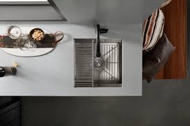 An earthy background with grey and green hues, slightly veined in pure white. Silestone Eternal Serena Quartz Worktops Net