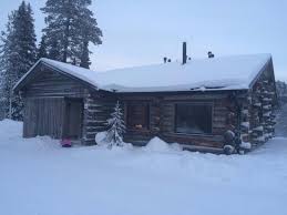 Close aerial shot flying backwards to reveal a snow covered log cabin in the woods in the colorado rocky mountains. Traditional Log Cabin In The Snow Just What We Wanted Picture Of Ruka Log Cabins 5804 Rukatunturi Tripadvisor