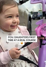 Dad Playing Golf with Daughter