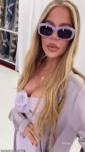 Khloe Kardashian glams up in a fitted mini dress with stylish sister Kylie  Jenner as she supports makeup mogul's Sprinter vodka soda launch