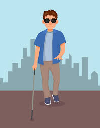 Young blind man in dark glasses walking ...