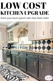 Painted Backsplash A Huge Impact For Little Money Tracey S Fancy In 2020 Diy Kitchen Cabinets Painting Kitchen Cabinets Paint Backsplash