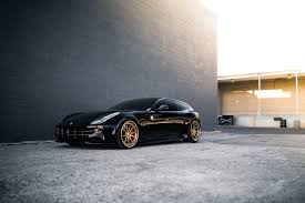 This Gorgeous Black Ferrari Ff Comes From Avant Garde Xotics A Los Angeles Tuning Powerhouse Featuring A Set Of Cus Ferrari Sports Cars Luxury Ferrari Italia