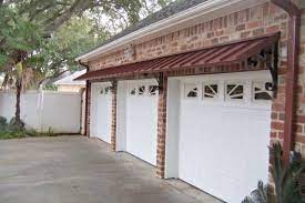 The Colonial Red Metal Classic Awnings Over Garage Doors Door Awnings Metal Awning Garage Doors