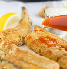 Pat the snapper fillets dry using paper towels, and season 2 fillets with salt and pepper before dipping them into the flour mixture. Crispy Air Fryer Fish My Forking Life